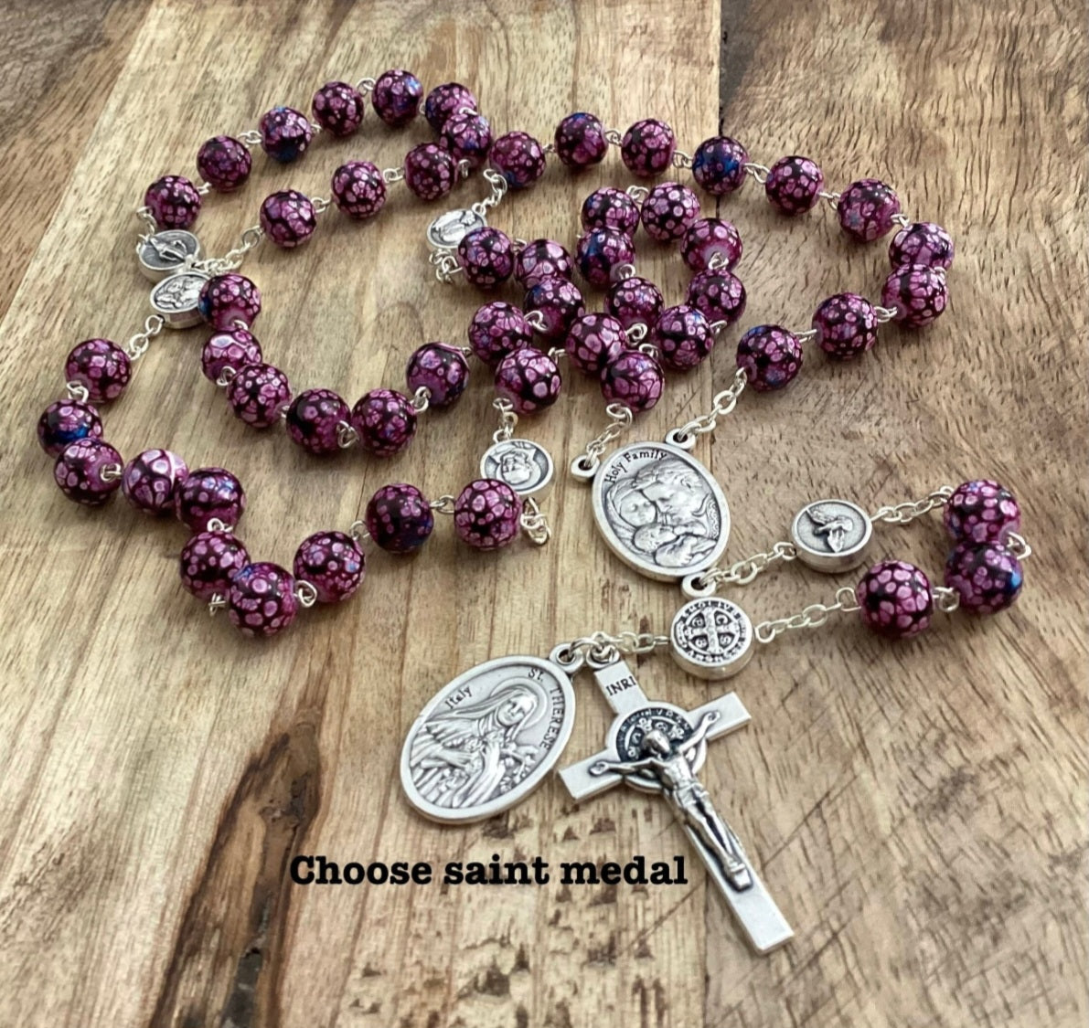 St Joseph purple rosary beads with Holy family medal