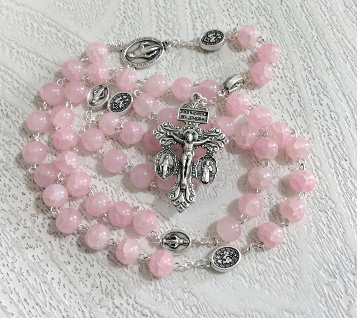 Pink rosary with Miraculous Medal centerpiece and Pardon crucifix