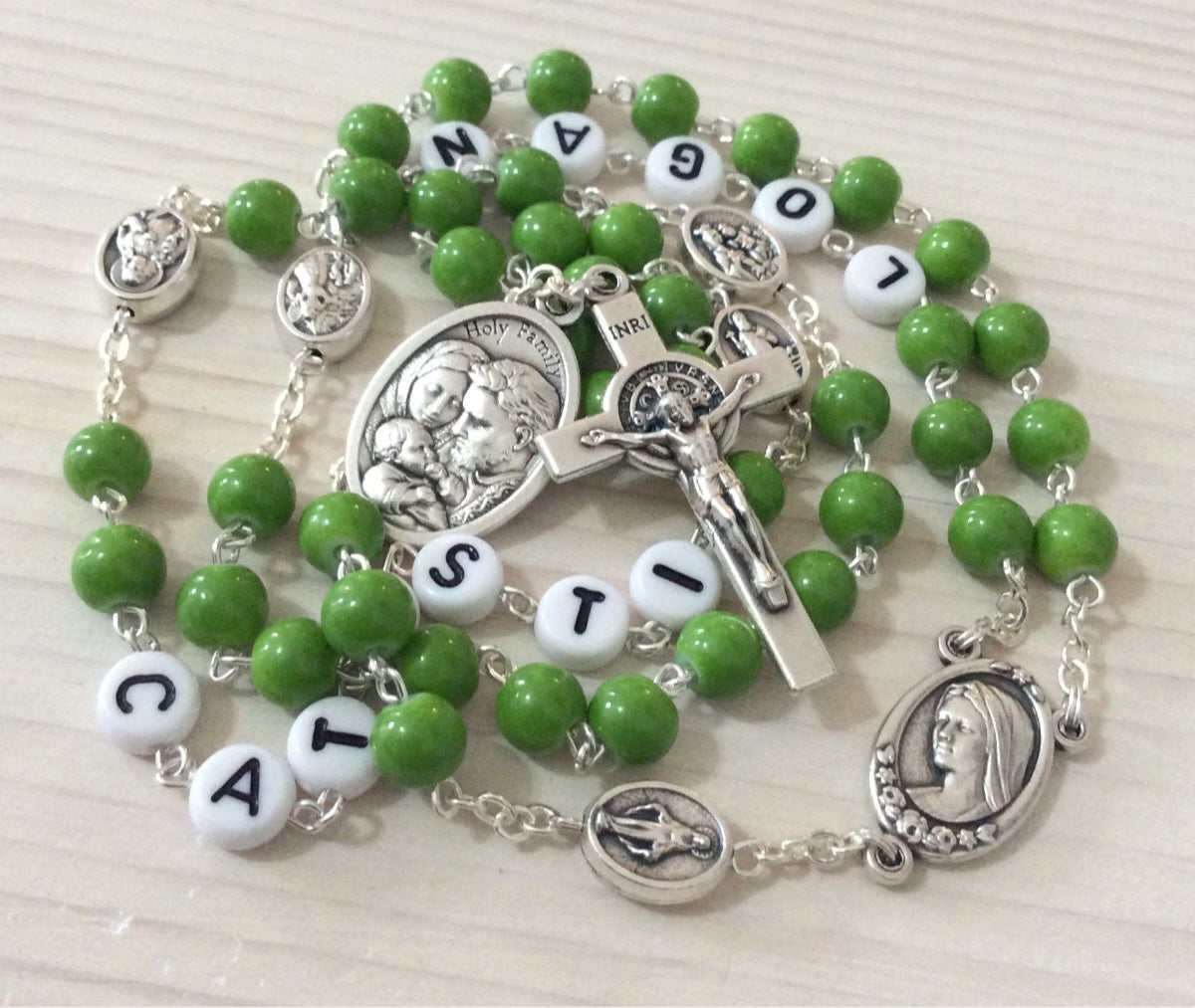Family rosary keepsake with personalized names for Catholic devotion and gifting