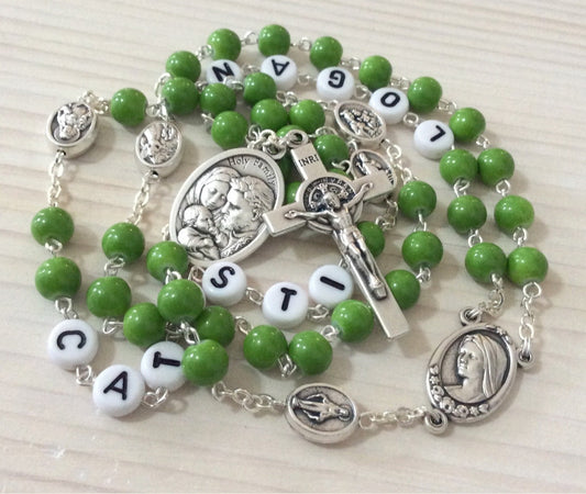 Family rosary keepsake with personalized names for Catholic devotion and gifting