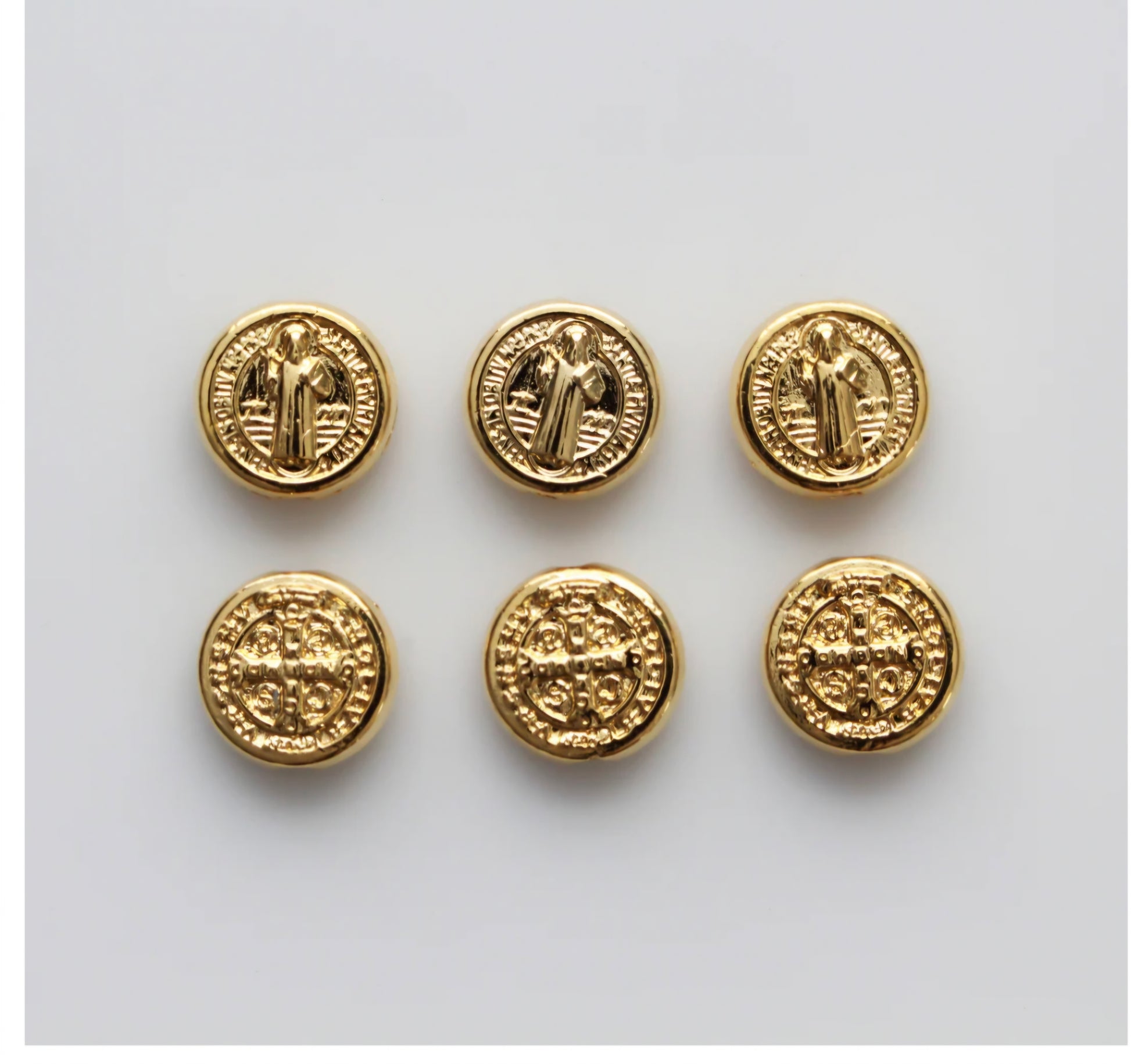 St Benedict gold spacer beads